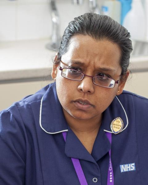 public health nurse with patient alt=""