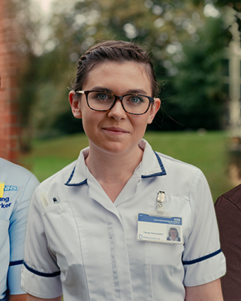 nhs staff looking at camera