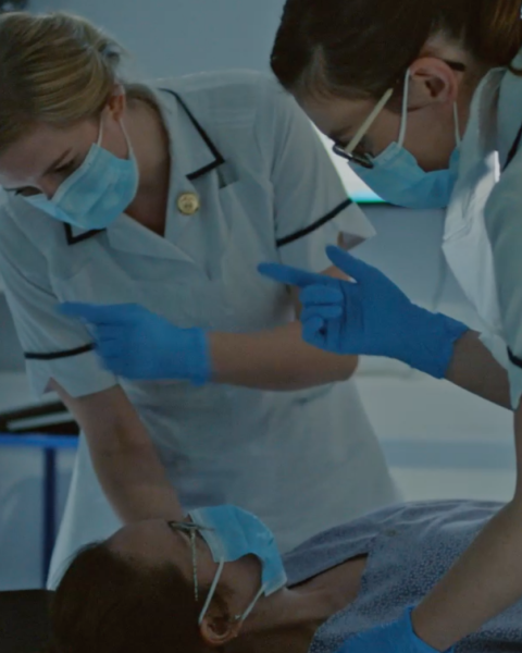 radiographers helping patients