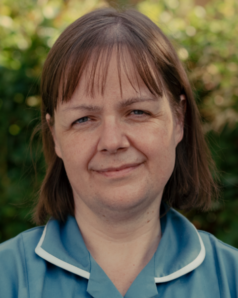 nurse smiling at camera