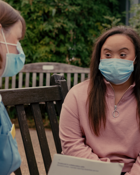 nurse talking to patient