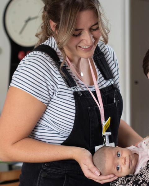 community midwife with family