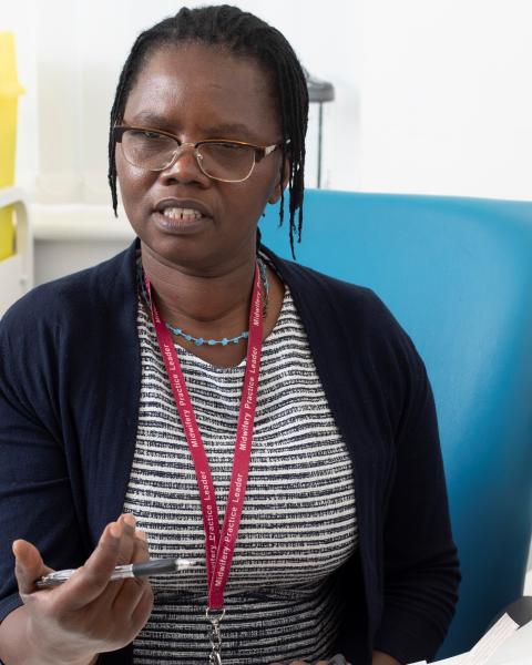 midwife with colleagues talking