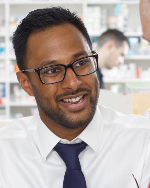 pharmacist with patient
