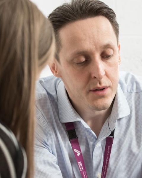 psychologist talking to client