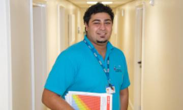 public health professional looking at camera