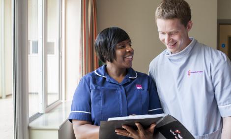Female nurse with male student nurse