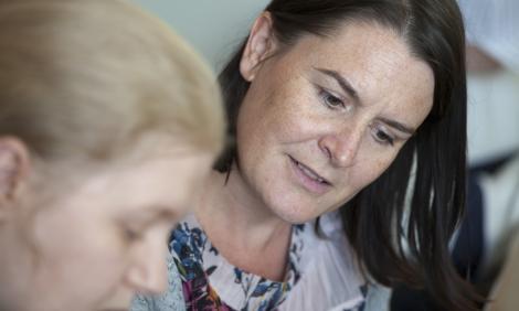 Mental health worker with client