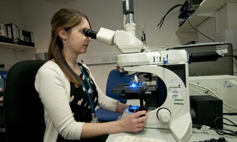 healthcare-science-female-looking-through-telescope-2