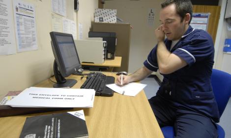 male nurse on phone 