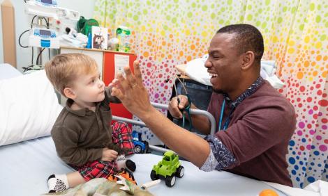 paediatrician with child