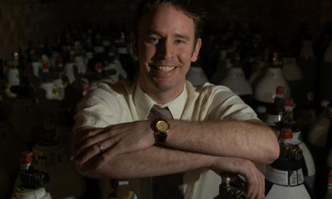 man with canisters