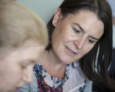 Mental health worker with client