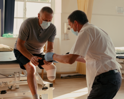 prosthetist with patient