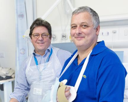 Portrait of Prof Kay with hand transplant patient Mark Cahill