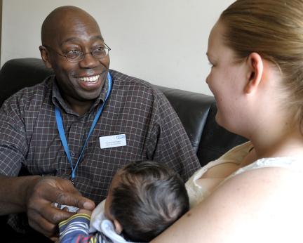 health visitor with mum and baby