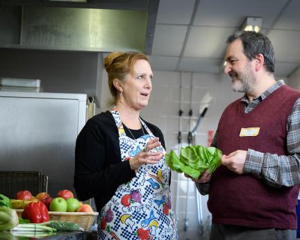 public health manager in conversation with school catering staff public health manager in conversation with school catering staff