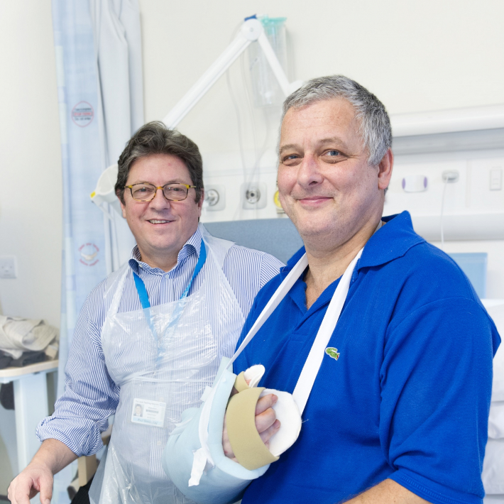 Portrait of Prof Kay with hand transplant patient Mark Cahill
