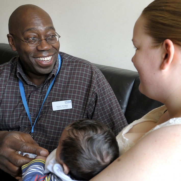 health visitor with mum and baby