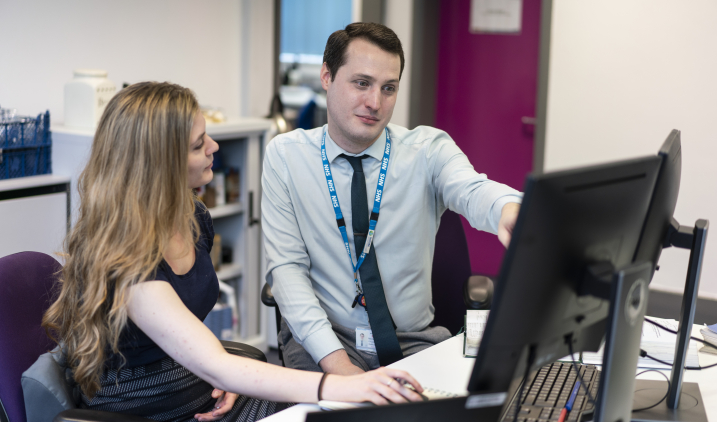 NHS finance staff talking