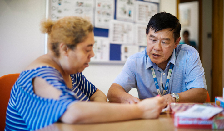 male learning disability nurse with patient