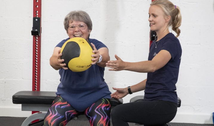 clinical exercise physiologist with patient