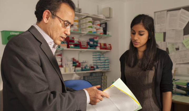 Female junior doctor with male consultant Female junior doctor with male consultant