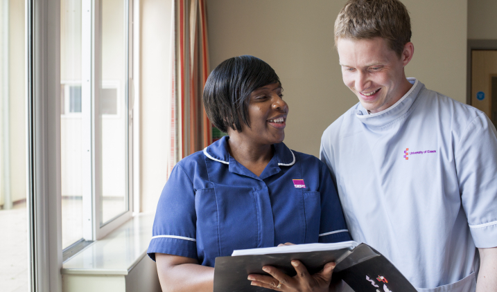 Female nurse with male student nurse