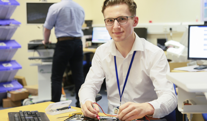 ICT support technician with computer equipment ICT support technician with computer equipment