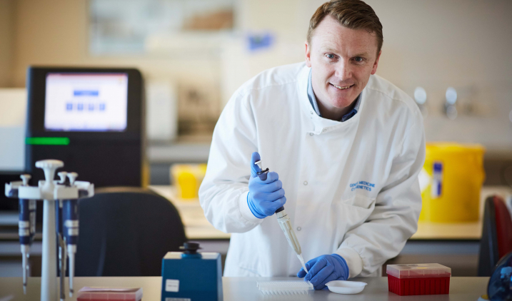 Male working in genetics lab Male working in genetics lab