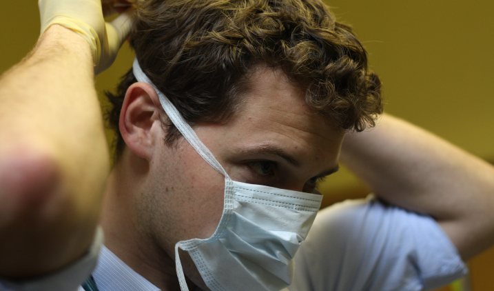 Male trainee with surgical mask