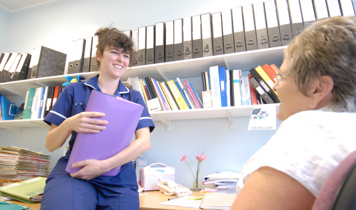 Nurse holding folder