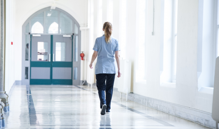 Student nurse walking in corridor Student nurse walking in corridor
