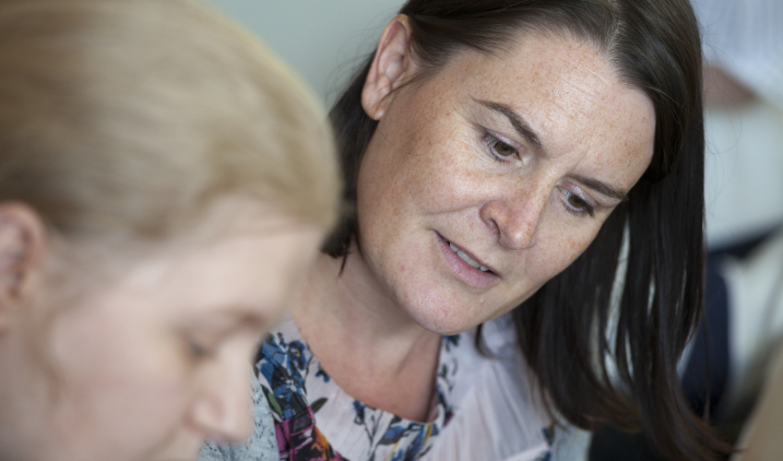 Mental health worker with client