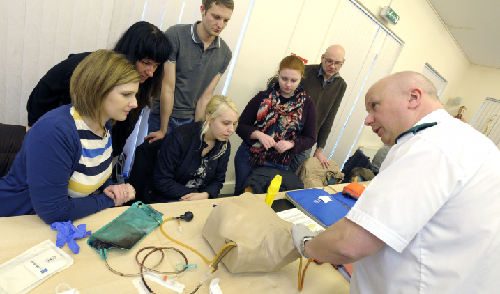 Young people receiving ambulance service training Young people receiving ambulance service training