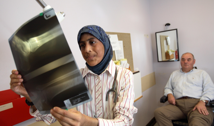 doctor with patient and x-ray doctor with patient and x-ray