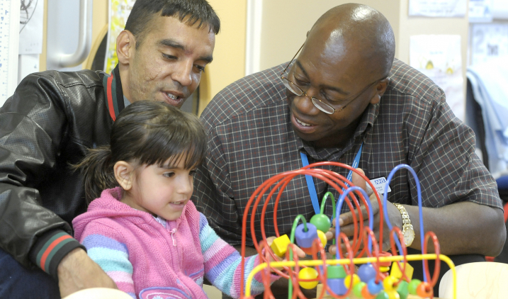 family with health play staff 