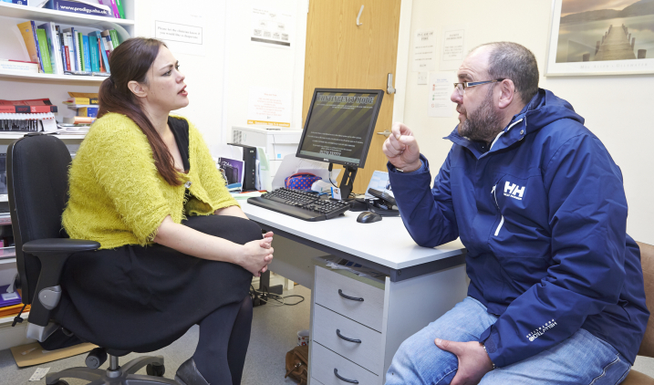 female GP with male patient 