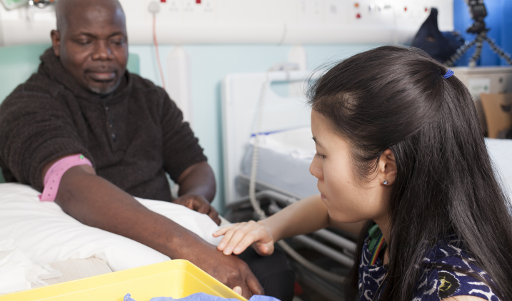 female doctor with patient on ward female doctor with patient on ward