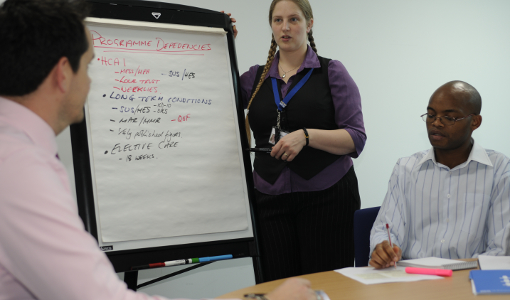 health informatics woman with whiteboard