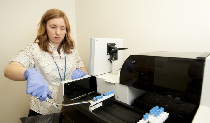 healthcare-science-female-handling-test-tube healthcare-science-female-handling-test-tube
