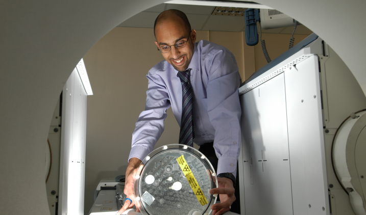 Healthcare scientist man with gamma camera