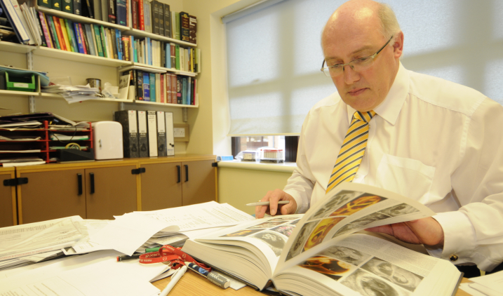 male-in-office-reading