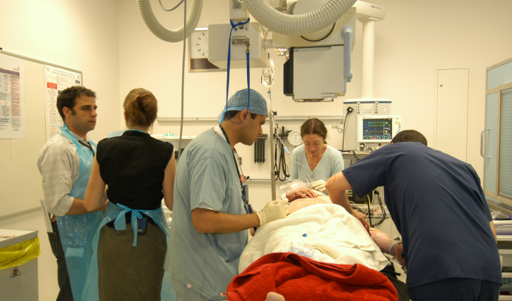Surgery patient with staff