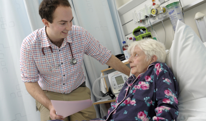 medicine-male-doctor-with-elderly-patient