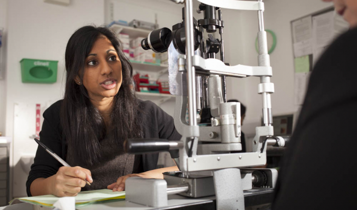 optometrist with patient