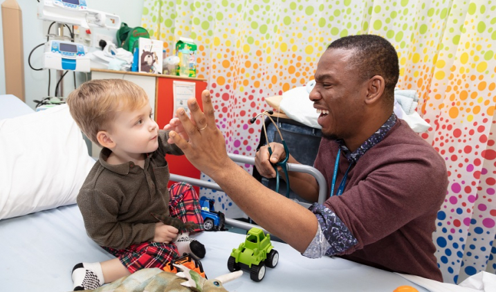 paediatrician with child