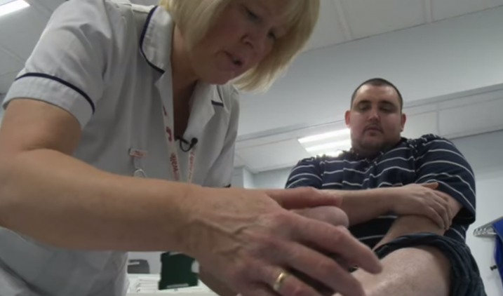 podiatry assitant with patient podiatry assitant with patient