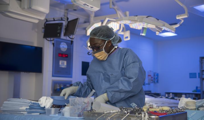 theatre nurse with equipment