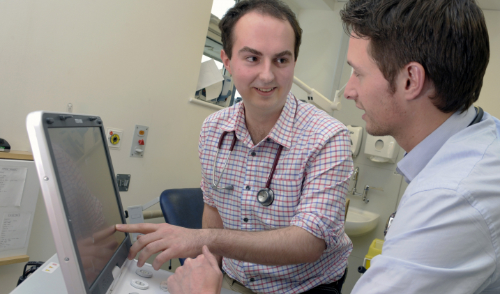 two male doctors talking